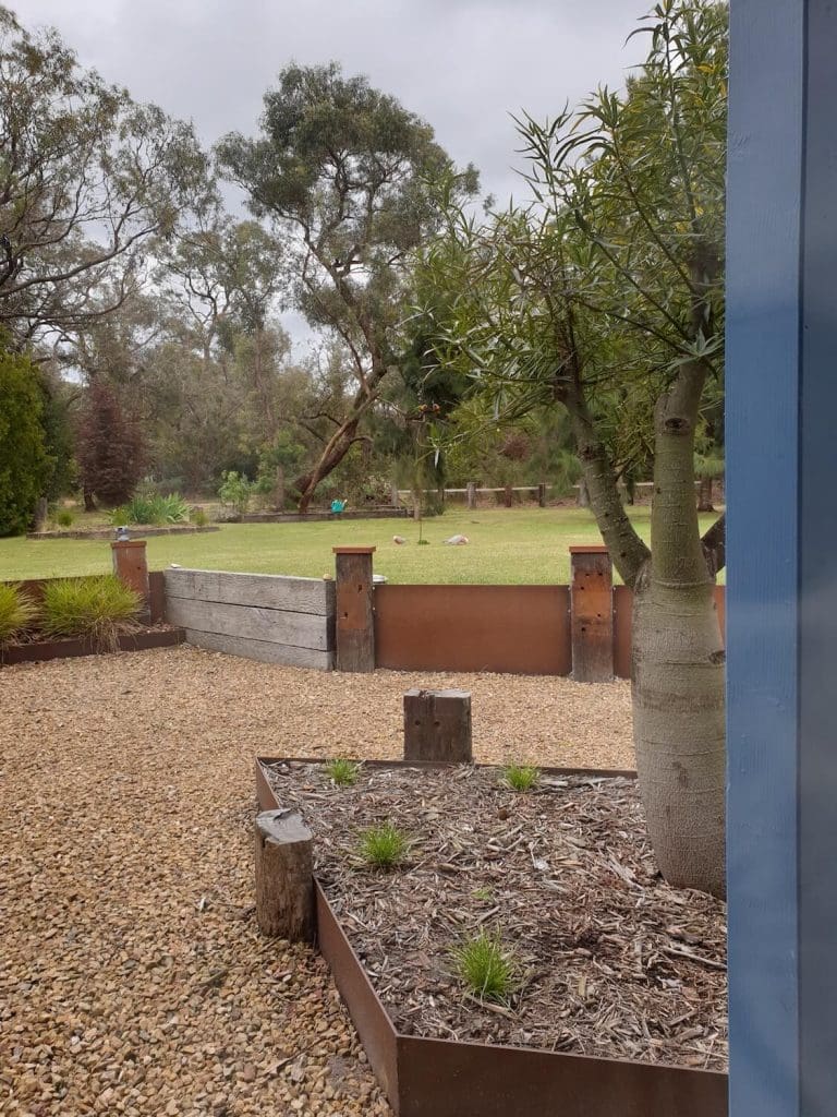 Steel Timber Retaining wall installation