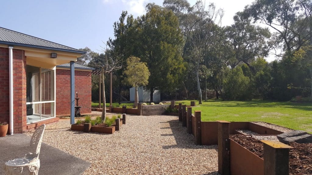 Steel and Stone Landscaping gravel and lawn